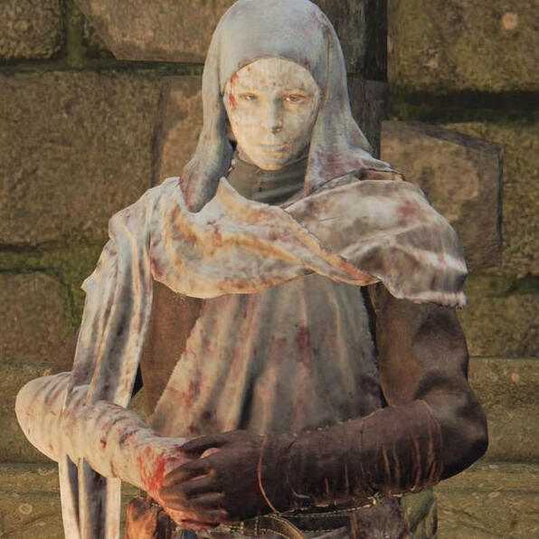 an in-game screenshot of varré with his hands folded in front of him