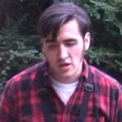 a screenshot of tim, looking away from the camera